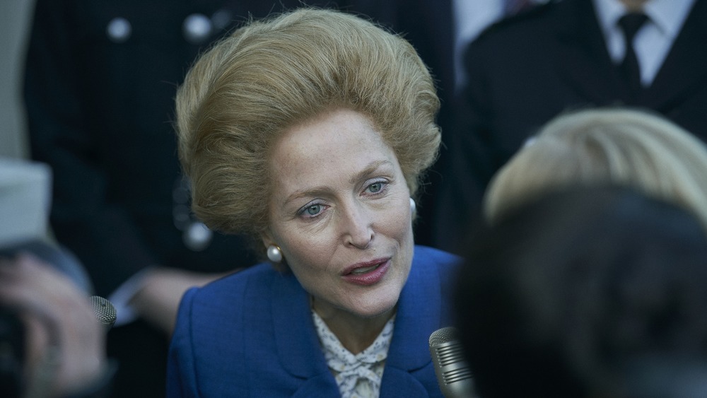 Margaret Thatcher speaking with reporters on The Crown