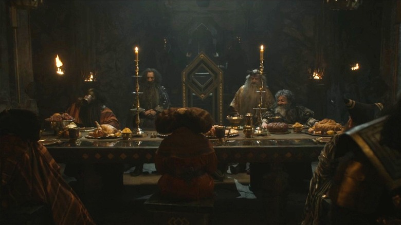 Dwarven emissaries sit at table