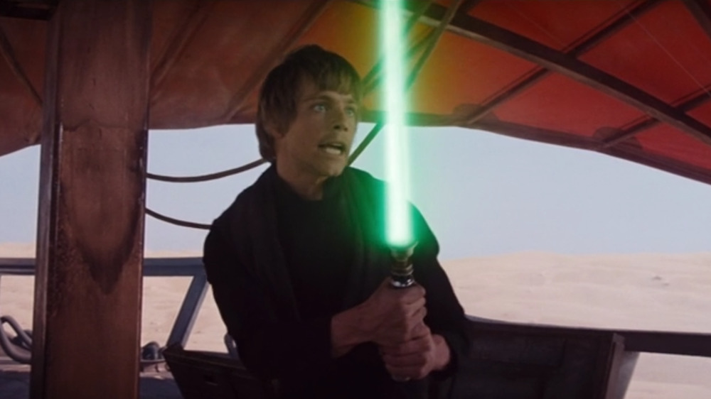 Luke wielding green lightsaber