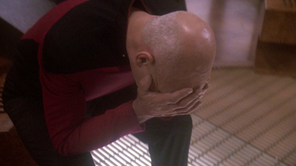 Picard holding head