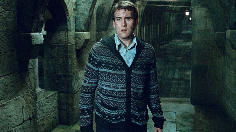 Neville Longbottom holding wand