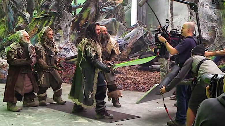 Four Dwarves face a camera crew