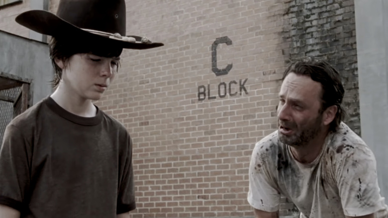 Rick crying with Carl