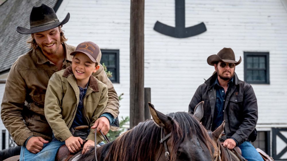 Luke Grimes and Brecken Merrill as Kayce and Tate Dutton