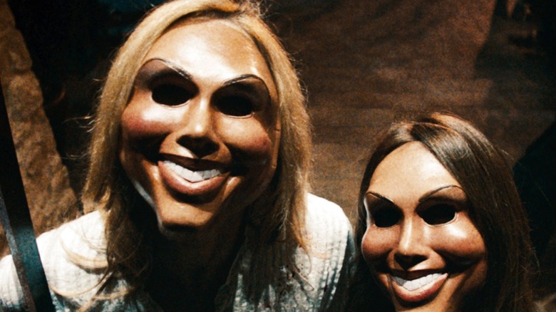 Masked couple in The Purge