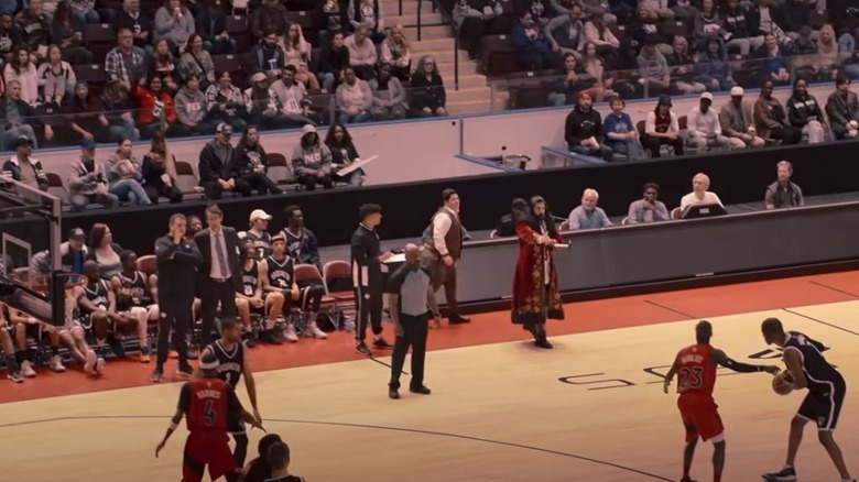 Nandor hypnotizing a basketball arena