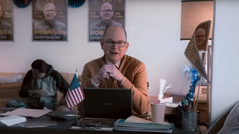 Colin Robinson sitting in campaign office