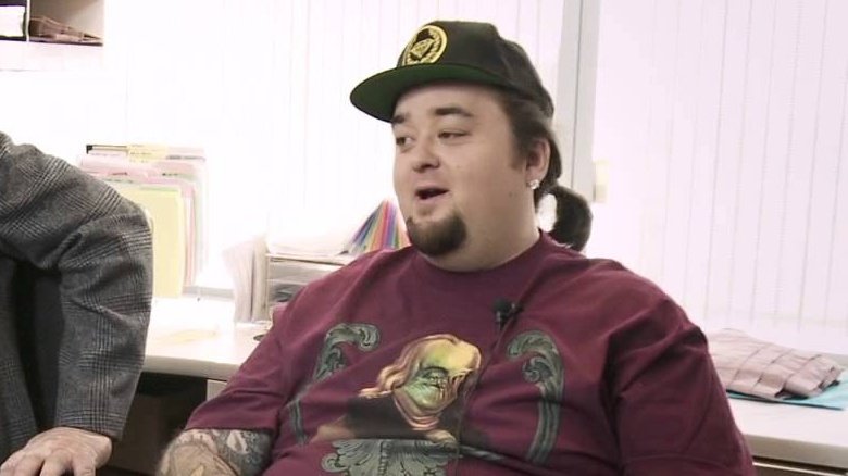 chumlee sitting in office 