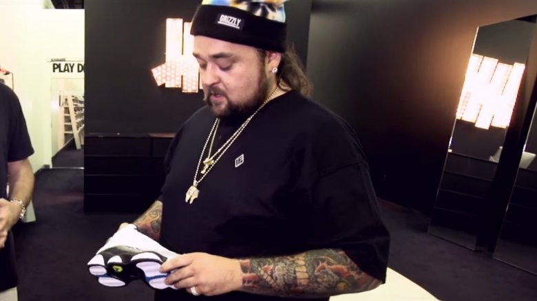 Chumlee holding a sneaker