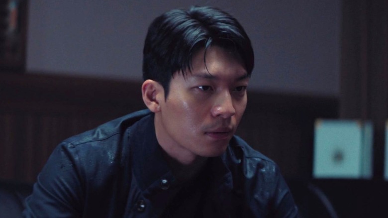 Jun-ho wearing a distracted expression in "Squid Game"