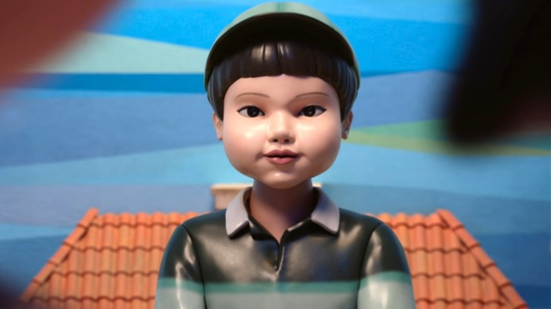 The creepy Cheol-su doll smiling in "Squid Game"