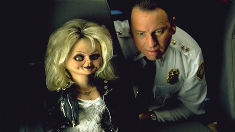 John Ritter alongside demented doll Tiffany in the film 'Bride of Chucky'