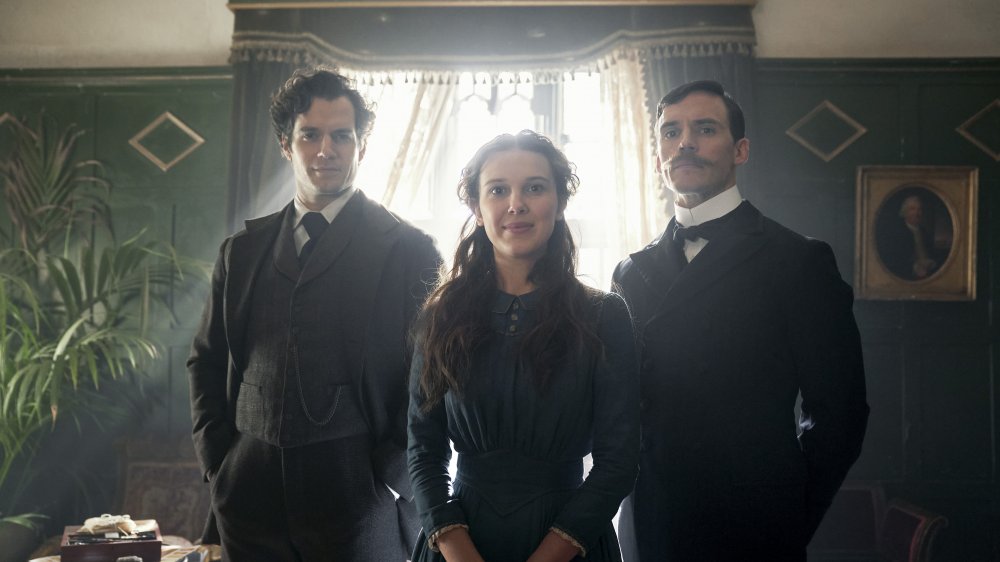 Millie Bobby Brown and Henry Cavill and Sam Claflin in Enola Holmes