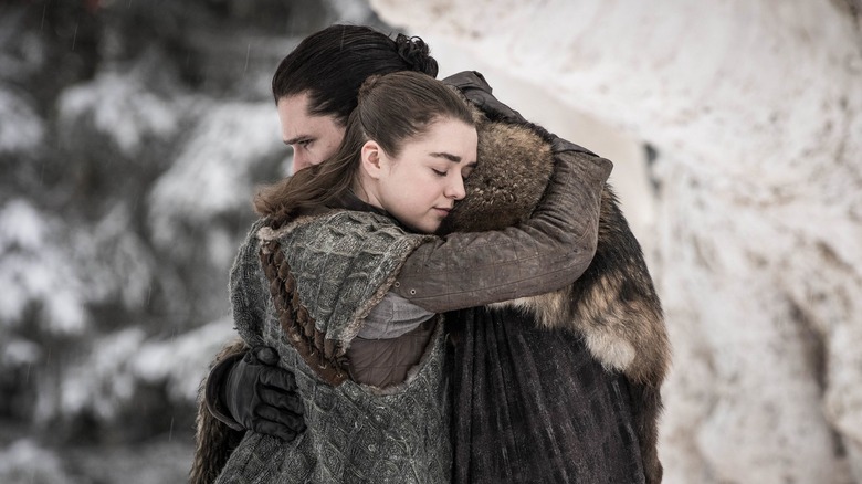 Arya hugs Jon Snow