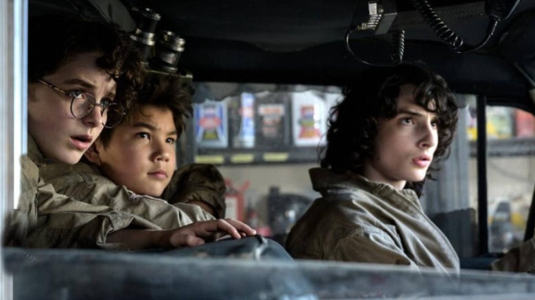 Mckenna Grace, Finn Wolfhard and Logan Kim in a scene from "Ghostbusters: Afterlife"