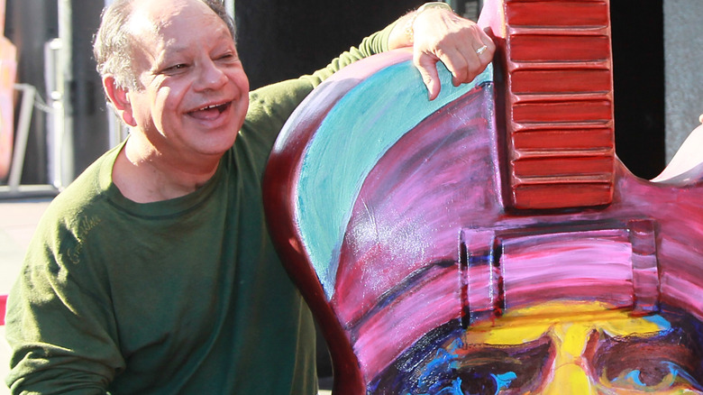 Cheech Marin signing GuitarTown Gibson guitar