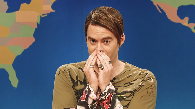 Stefon covering his mouth