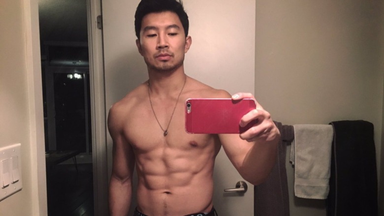 Simu Liu shirtless in mirror