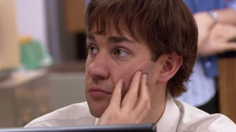 Jim Halpert touching his face