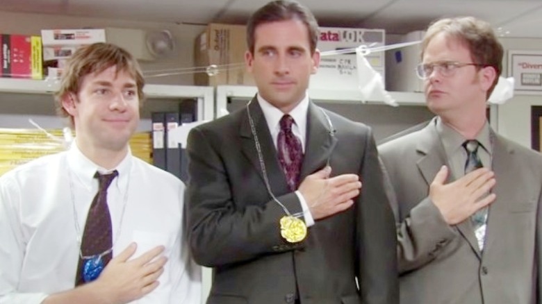 Michael Scott wearing a medal