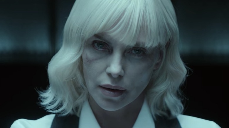 Theron close-up with bruised face in 'Atomic Blonde'