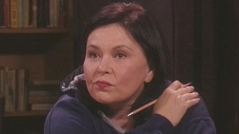 Roseanne Barr holding pencil 