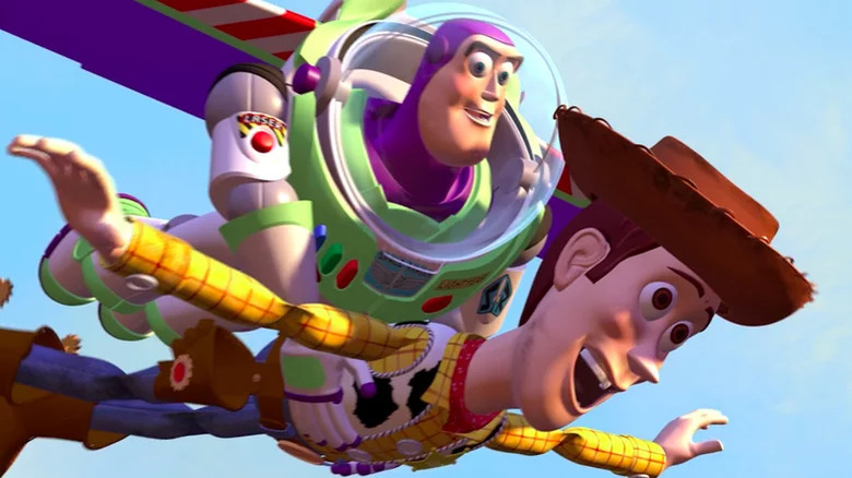 Woody and Buzz flying 