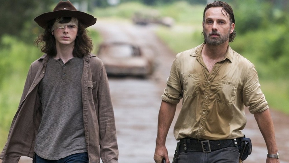 Rick and Carl Grimes walking down the road