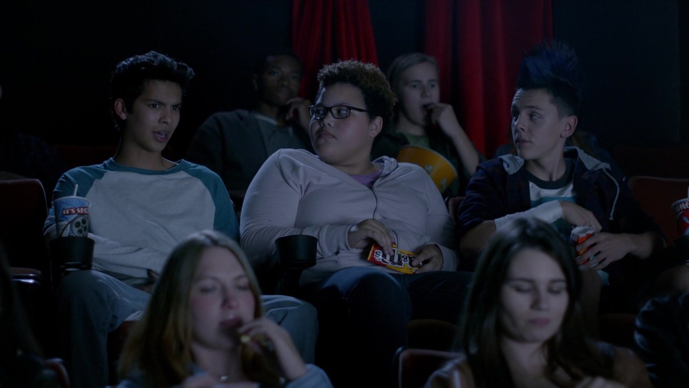 Cobra Kai's teens in a movie theater