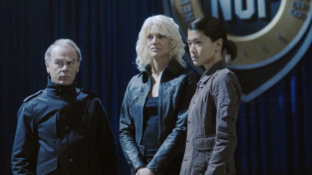 Dean Stockwell, Tricia Helfer, and Grace Park in Battlestar Gallactica