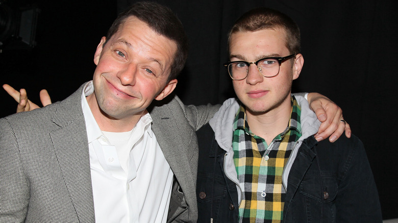 Jon Cryer and Angus Jones posing together for a photo at the reception of "What Doesn't Kill Us Makes Us Bitter" in 2012