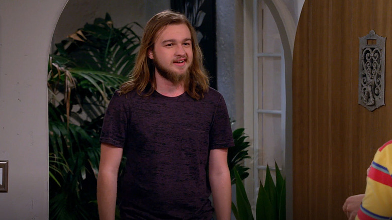 A bearded and long-haired Jake Harper appearing in "Two and a Half Men" Season 12 (2015)