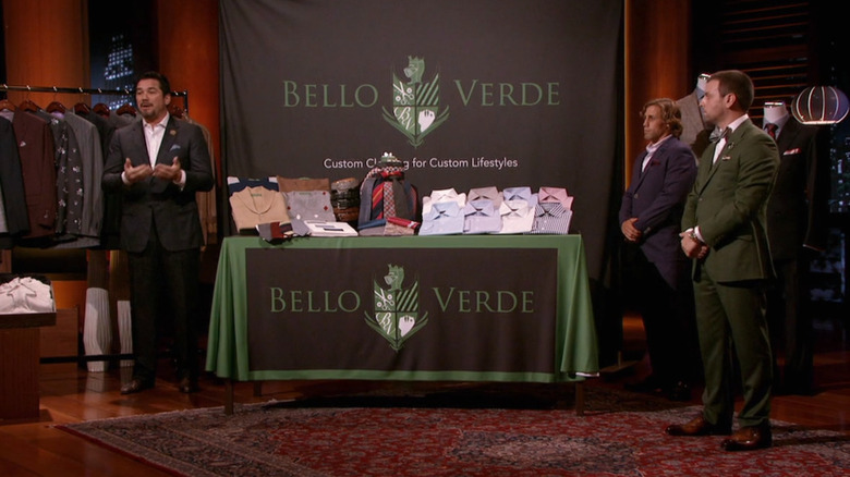 Dean Cain speaking next to Bello Verde display