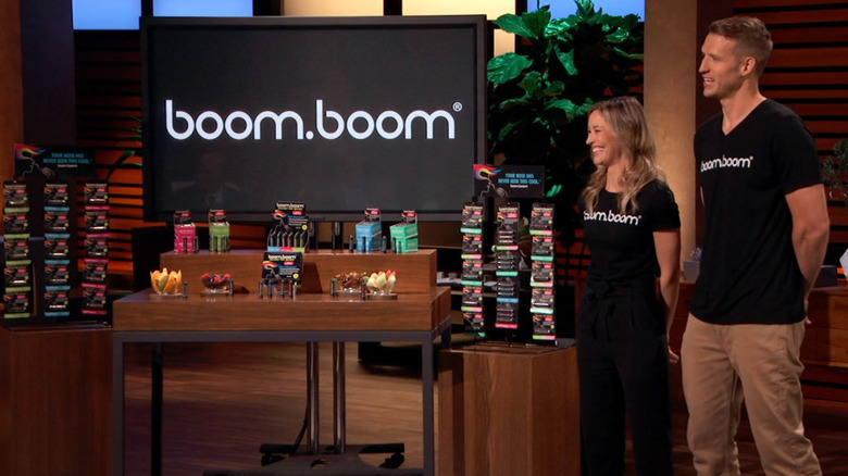 John and Chelsea presenting next to BoomBoom display