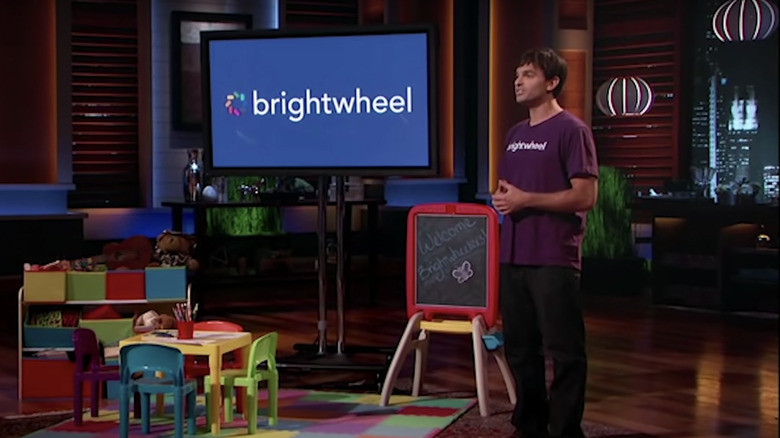 Brightwheel CEO Dave Vasen surrounded by preschool objects presenting Brightwheel on Shark Tank