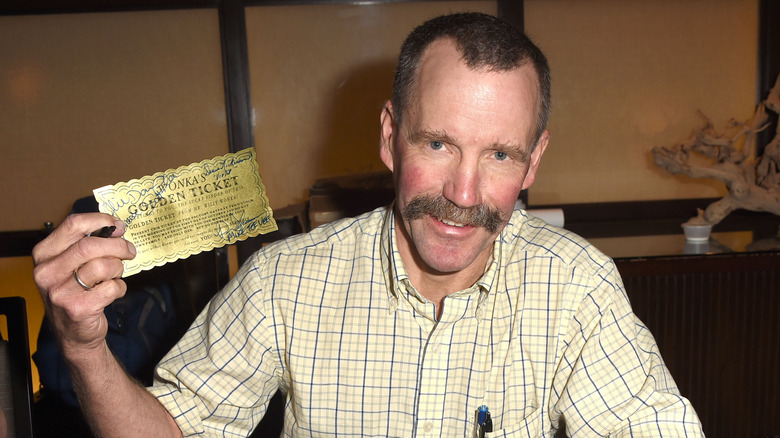 Peter Ostrum smiling with golden ticket