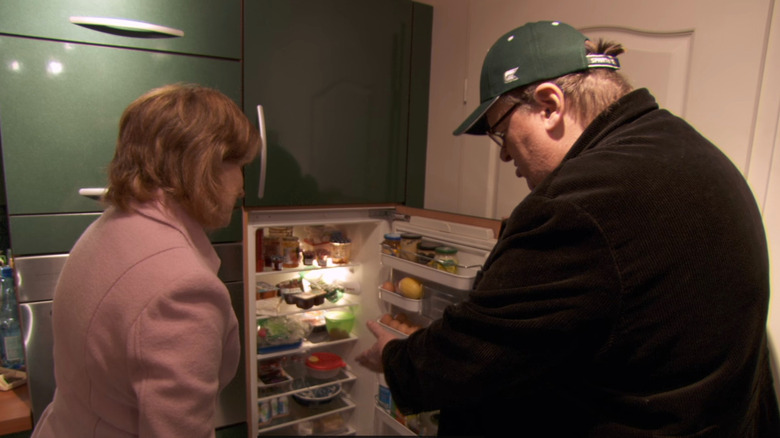 Michael Moore points at fridge