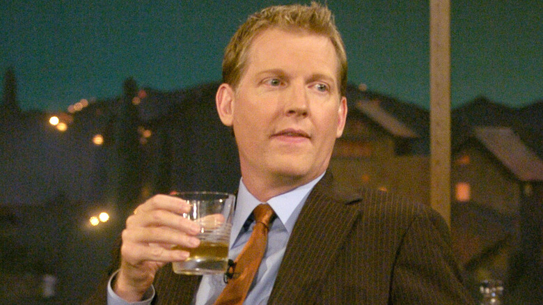 Craig Kilborn sips a drink