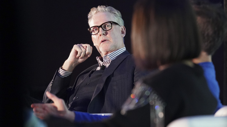 Craig Kilborn sits on stage