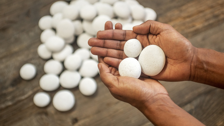 Person holding Parting Stones