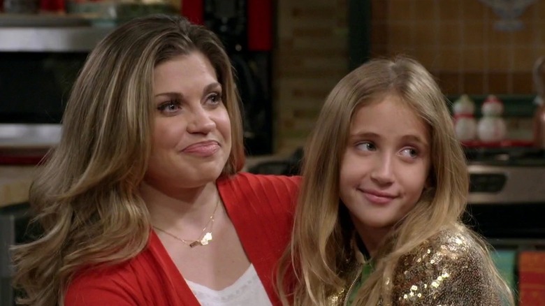 Topanga holds daughter