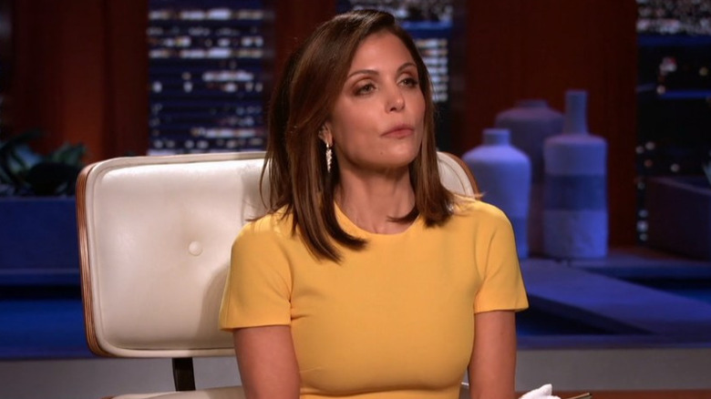 Bethenny Frankel looking annoyed yellow shirt