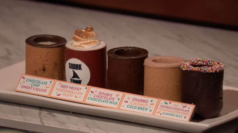 Various Dirty Cookie flavors lined up on a tray