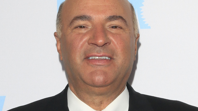 Kevin O'Leary half-smiling