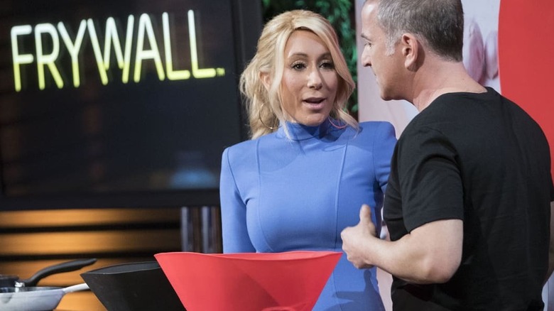 Reiner standing with Lori Greiner