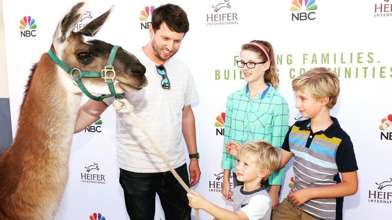 Jon Heder and kids with a camel