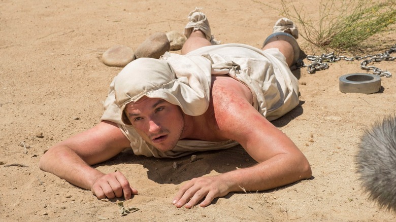 Josh Hutcherson lying on stomach