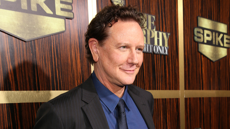 Judge Reinhold smirking