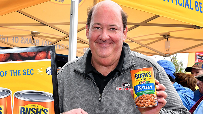 Brian Baumgartner holding beans