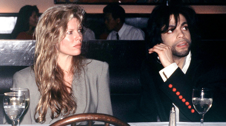 Kim Basinger in restaurant with Prince